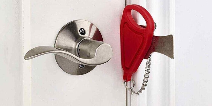 Use a portable door lock