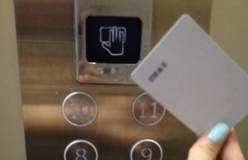 Swipe the key card to use the hotel elevator and enter the right floor